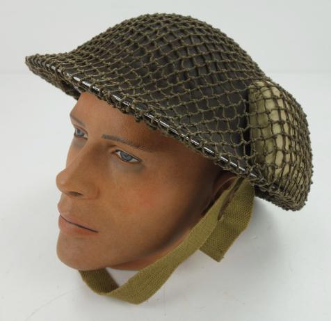 British Brodie Helmet with camo net and Bandage
