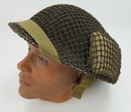 British Brodie Helmet with camo net and Bandage