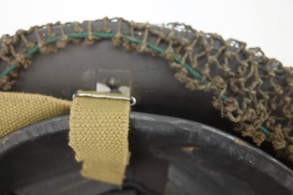 British Brodie Helmet with camo net and Bandage