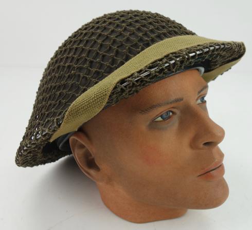British Brodie Helmet with camo net and Bandage