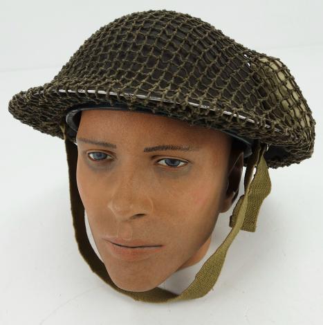 British Brodie Helmet with camo net and Bandage