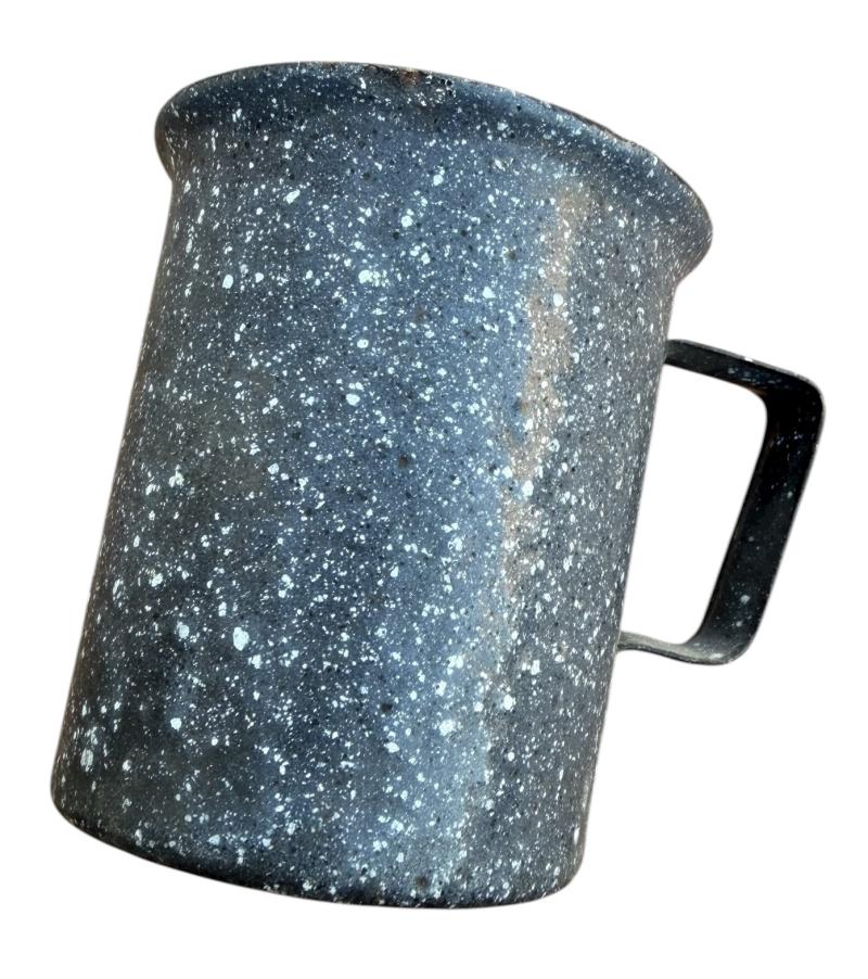 Metal and enameled mugs made from 7,5 cm KwK Shell.