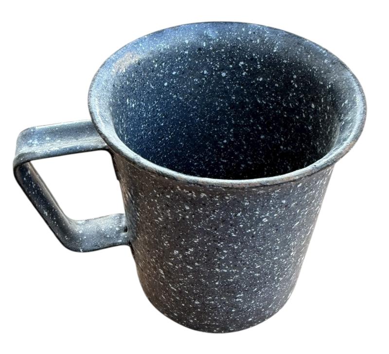 Metal and enameled mugs made from 7,5 cm KwK Shell.