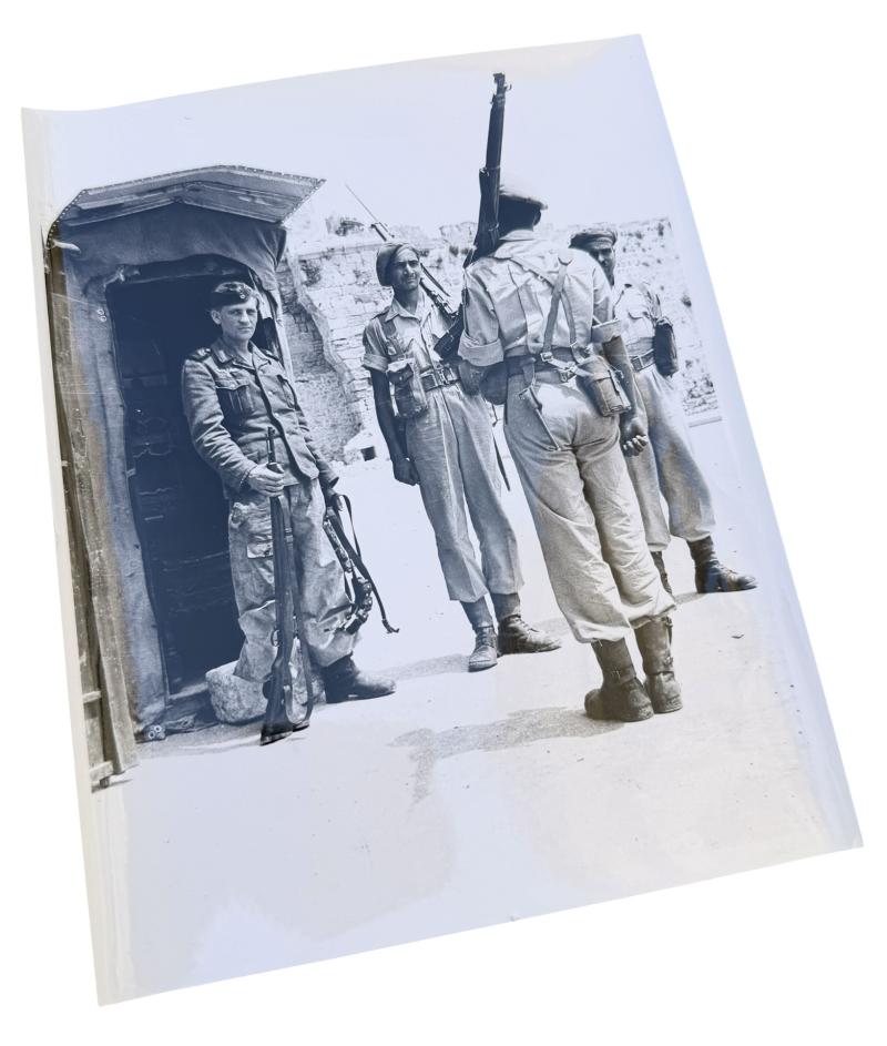 Very nice photograph of Kriegsmarine Costal Artillery Soldier holding guard with British Soldiers